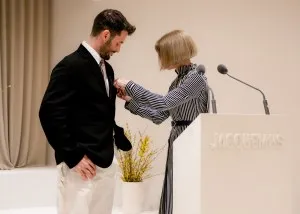 Anna Wintour decorates Simon Porte Jacquemus with the Chevalier de l'Ordre des Arts et des Lettres award.