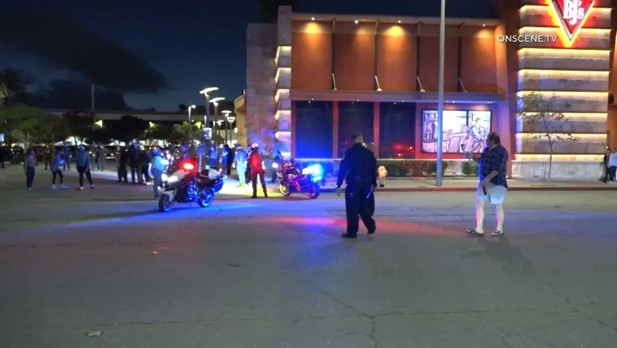 A disturbance involving a large crowd of juveniles shut down streets around the Del Amo Fashion Center in Torrance on Dec. 30, 2023. (OnScene.TV)