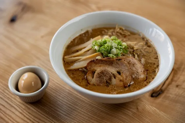 The Akahoshi miso ramen with ajitama egg on the side at Akahoshi Ramen in Chicago on March 28, 2024. (Vincent Alban/Chicago Tribune)