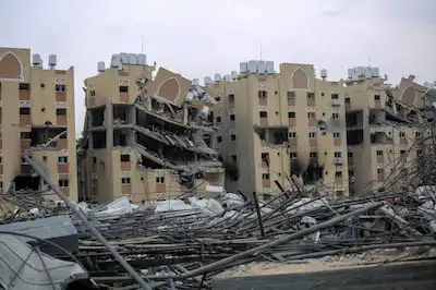 Damaged homes in Khan Yunis after Israeli air strikes. Getty Images