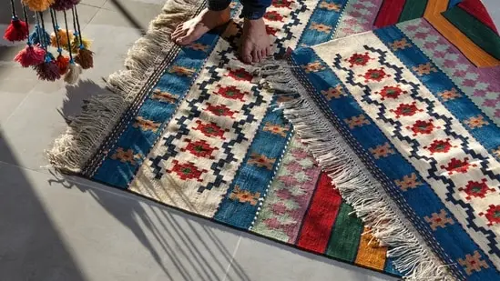 Rugs: Add elegant rugs to your floors, such as traditional Persian or Turkish rugs, to add a touch of sophistication to your home. (Unsplash)