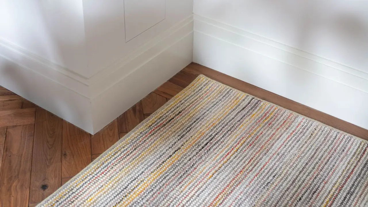 A custom rug fits perfectly into a corner.