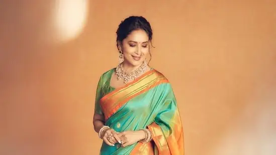 First and foremost, women are adorned in paithani sarees available in bright colours with intricate hand embroidery. This traditional classic piece is a wardrobe essential for your Gudi Padwa celebrations and can be paired with naths, bangles, and jhumkas for an elegant look. (Instagram)