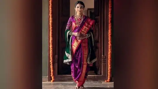 The next best choice for the festival is Nauvari sarees. The unique draping style of the nauvari saree worn by Maharashtrian women allows for easy movement during the festival and keeps your comfort a priority. Complete the look with traditional accessories and a bindi. (Pinterest)