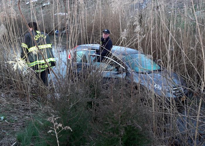 Disabled man rescued when car crashes into drainage ditch (VIDEO)