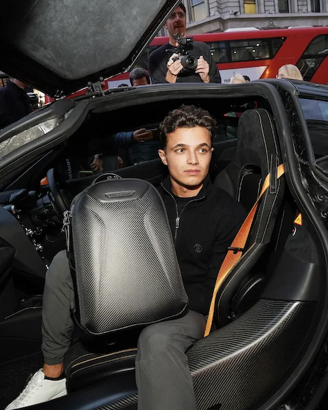 a person sitting in a car a person sitting in a car
