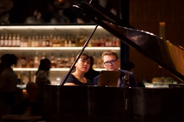 Sun-A Park and Ammon Perry Bratt celebrate the music of George Gershwin during an April 4, 2024, concert, part of UCF Celebrates the Arts at the Dr. Phillips Center for the Performing Arts in Orlando. (Courtesy Jessica Abels via UCF)