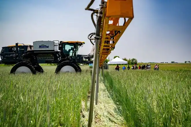 A high-clearance cover crop seeder on display during an event held by the Iowa Agricultural Water Alliance to mark the 10th anniversary of the Iowa Nutrient Reduction StrategyI. owa State University Extension is offering a new program that targets landowners in the Des Moines River watershed, helping them learn more about conservation practices.