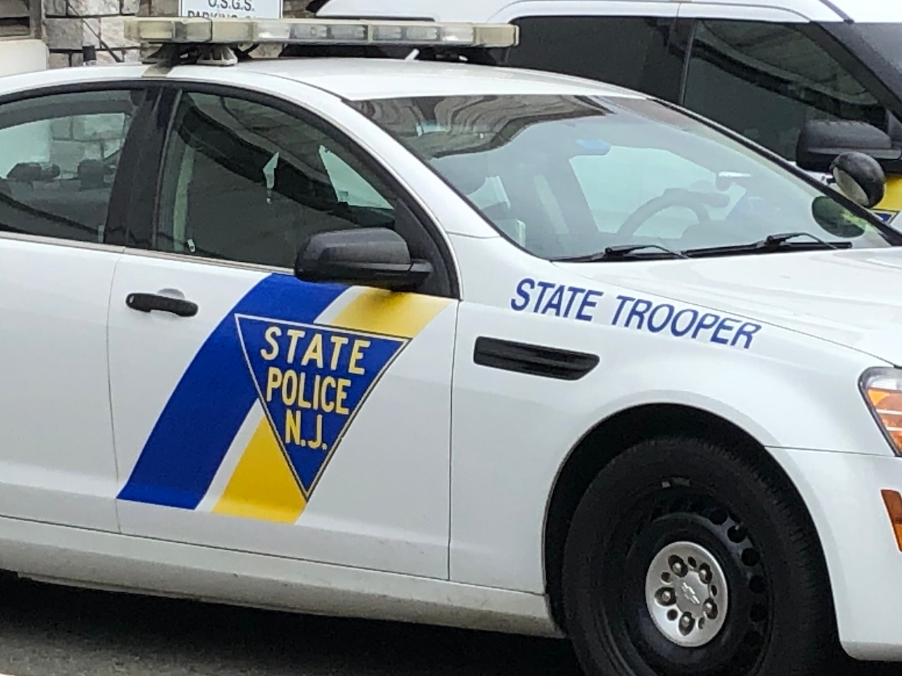 Motorcyclist dies after crashing into state trooper’s car, investigators say