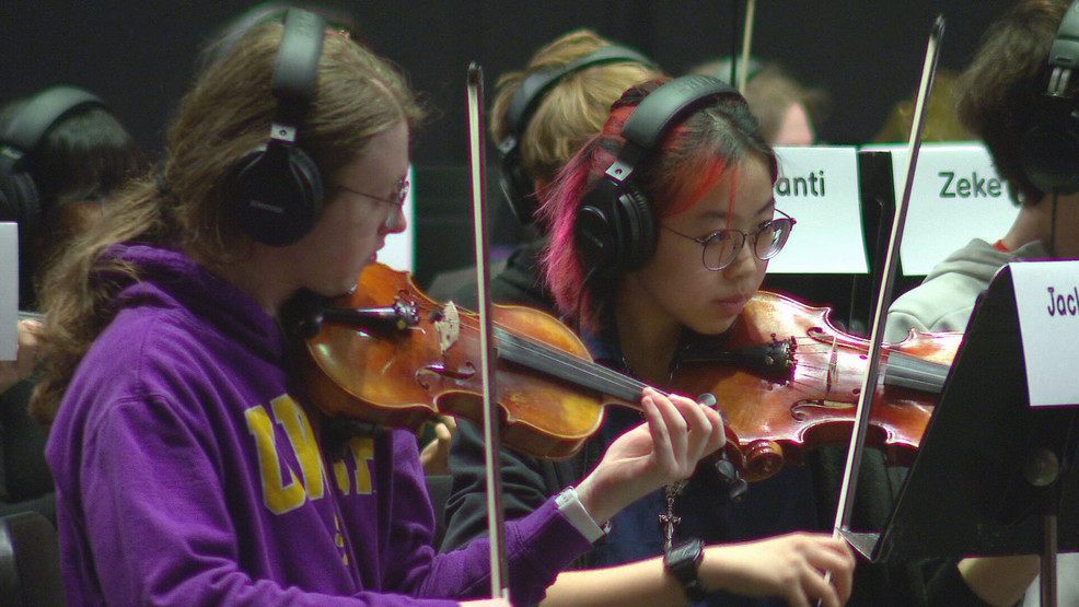 Northeast Wisconsin music students preparing for professional concert with indie folk band