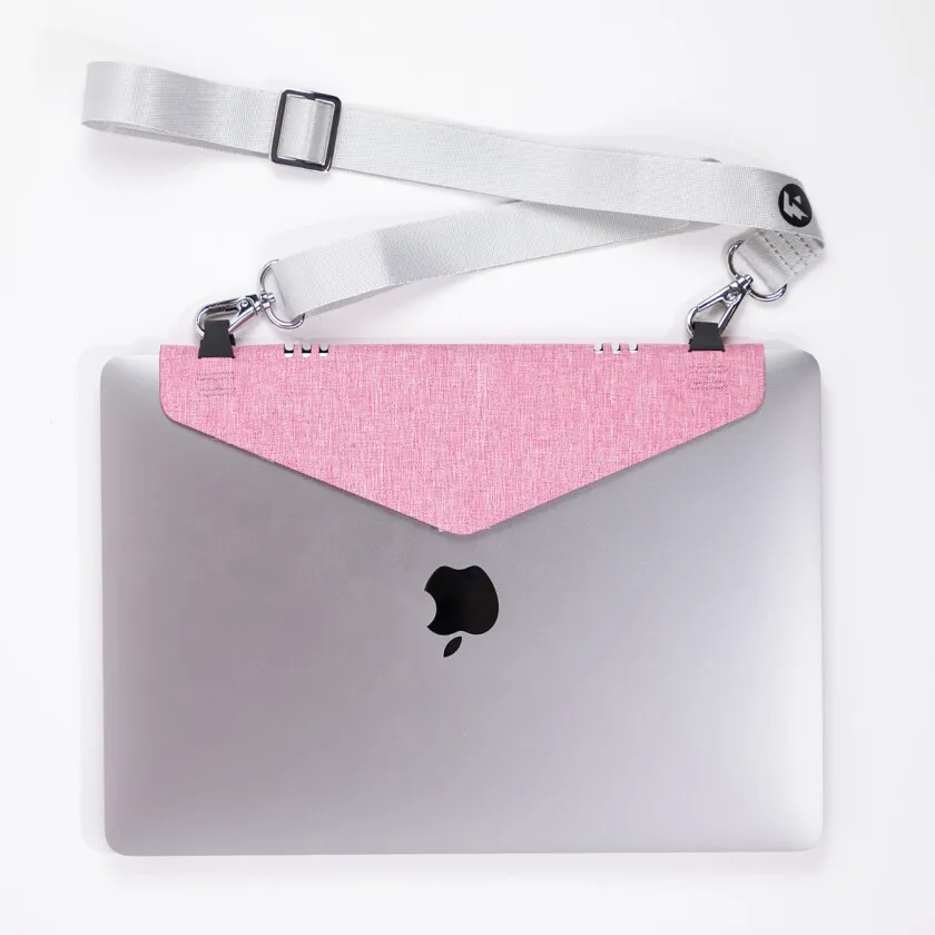 The Laptop Strap is attached to a Macbook laptop