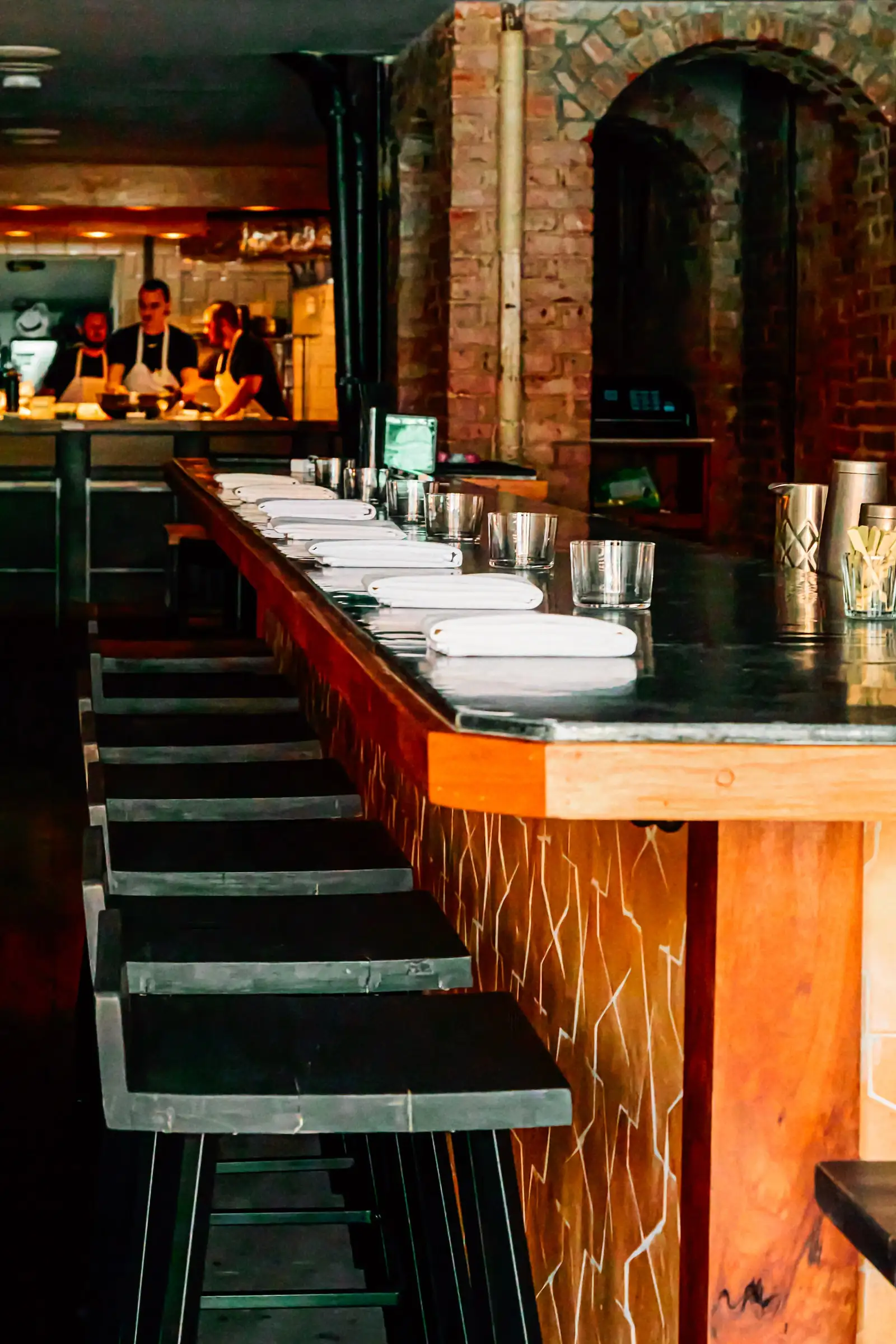 A row of stools in front of a bar in Corima.