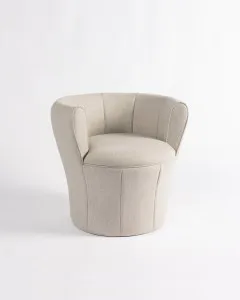 Driade’s Lisa armchair upholstered in Vitale Barberis Canonico fabric.