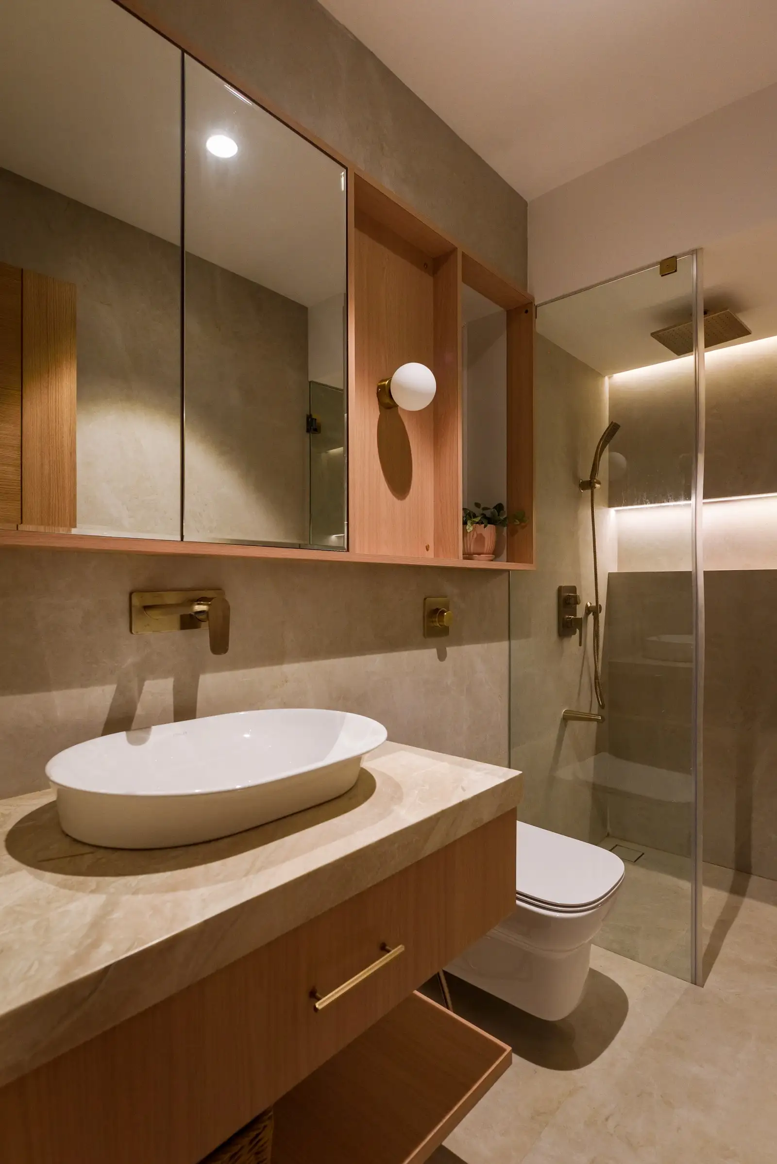 Image may contain Plant Sink Basin Lamp Bathroom Indoors Room Toilet and Sink Faucet