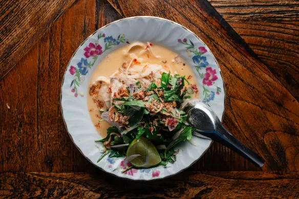 Steamed fish fillet with coconut milk, fresh herbs and makrut lime leaf.