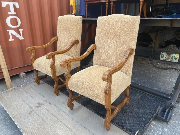 The stodgy tapestry dining armchairs before their transformation. (Courtesy of Marni Jameson)