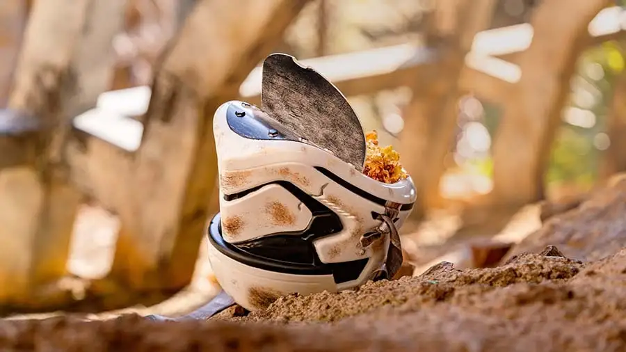 The Salvaged Stormtrooper Helmet Bucket sitting on the ground.