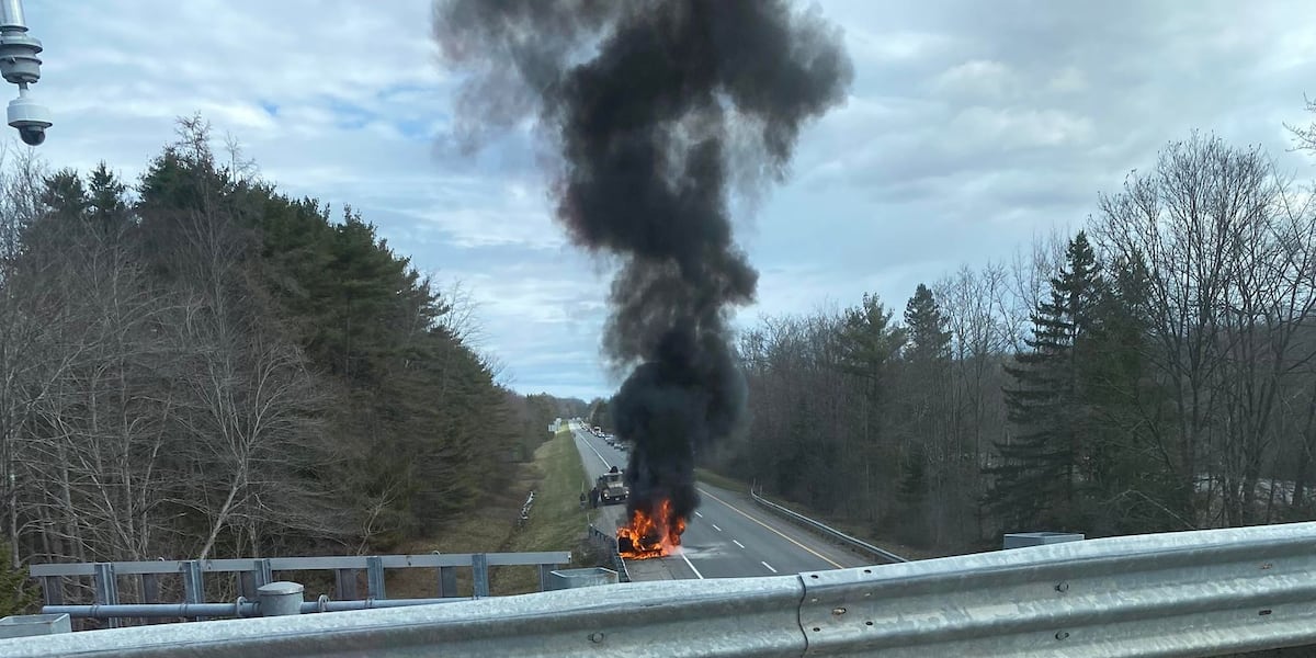 Couple pulled from burning car on I-95