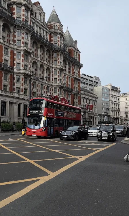 A hallmark London red double-decker bus.