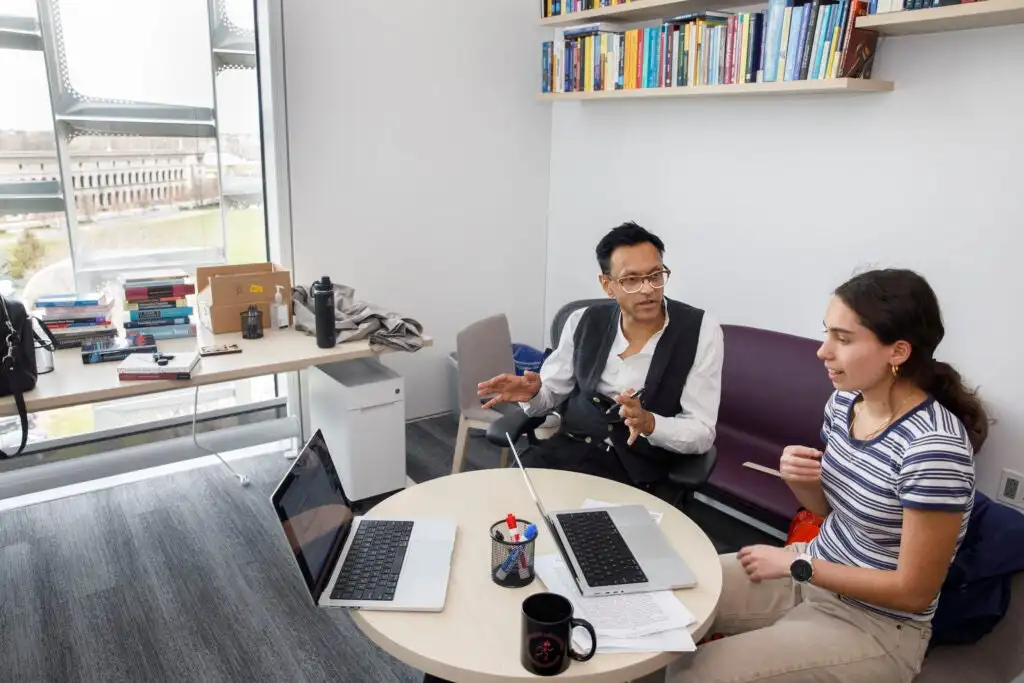 Sham Kakade, Co-director of the Kempner Institute, and Clara Mohri sitting at a desk