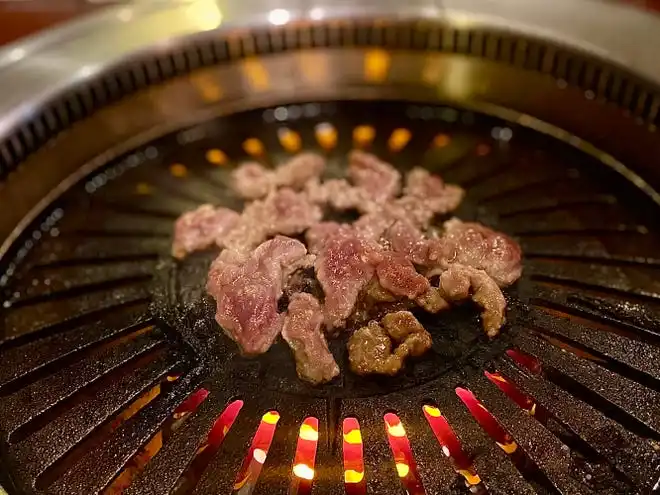 Bulgogi (marinated ribeye) on the grill at Hanwoo Korean BBQ in Port Orange.