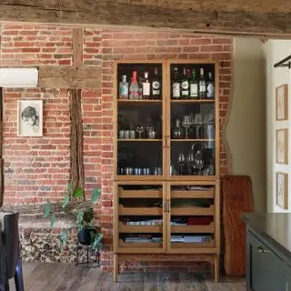 Main kitchen, full hight ceiling, exposed beams, habidshery cabinet