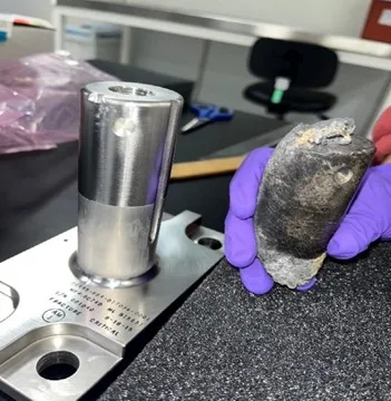 NASA released this image, which shows the recovered piece of space debris. It weighs 1.6 pounds. Credit: NASA.