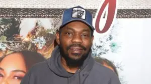 Beanie Sigel posing for a picture.