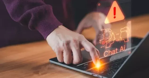 Man using a laptop chatting with smart AI, apps artificial intelligence chatbot with triangle caution warning sign for notification error. Chat with application AI, Artificial Intelligence.