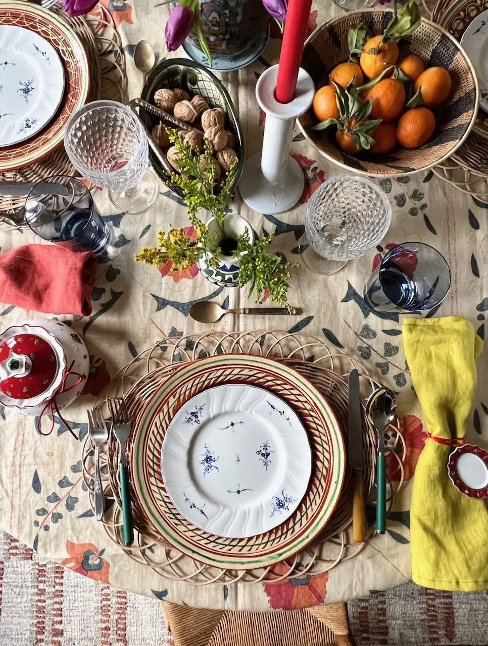 a table with plates and glasses