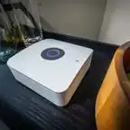 a Ring Alarm Pro base station next to a fruit bowl