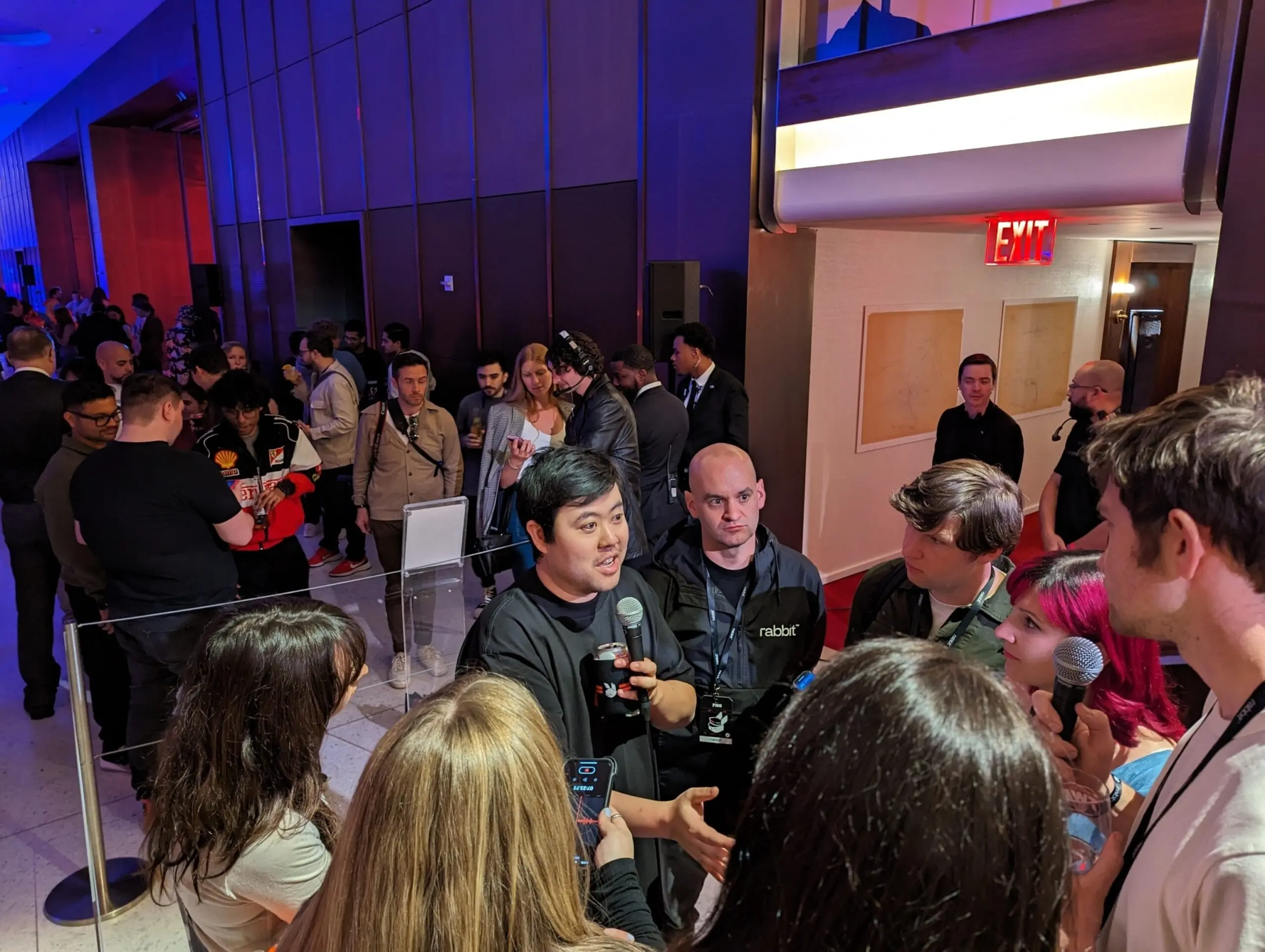 PHOTO: Rabbit CEO Jesse Lyu answers questions from reporters at the TWA Hotel, April 23, 2024, in New York.