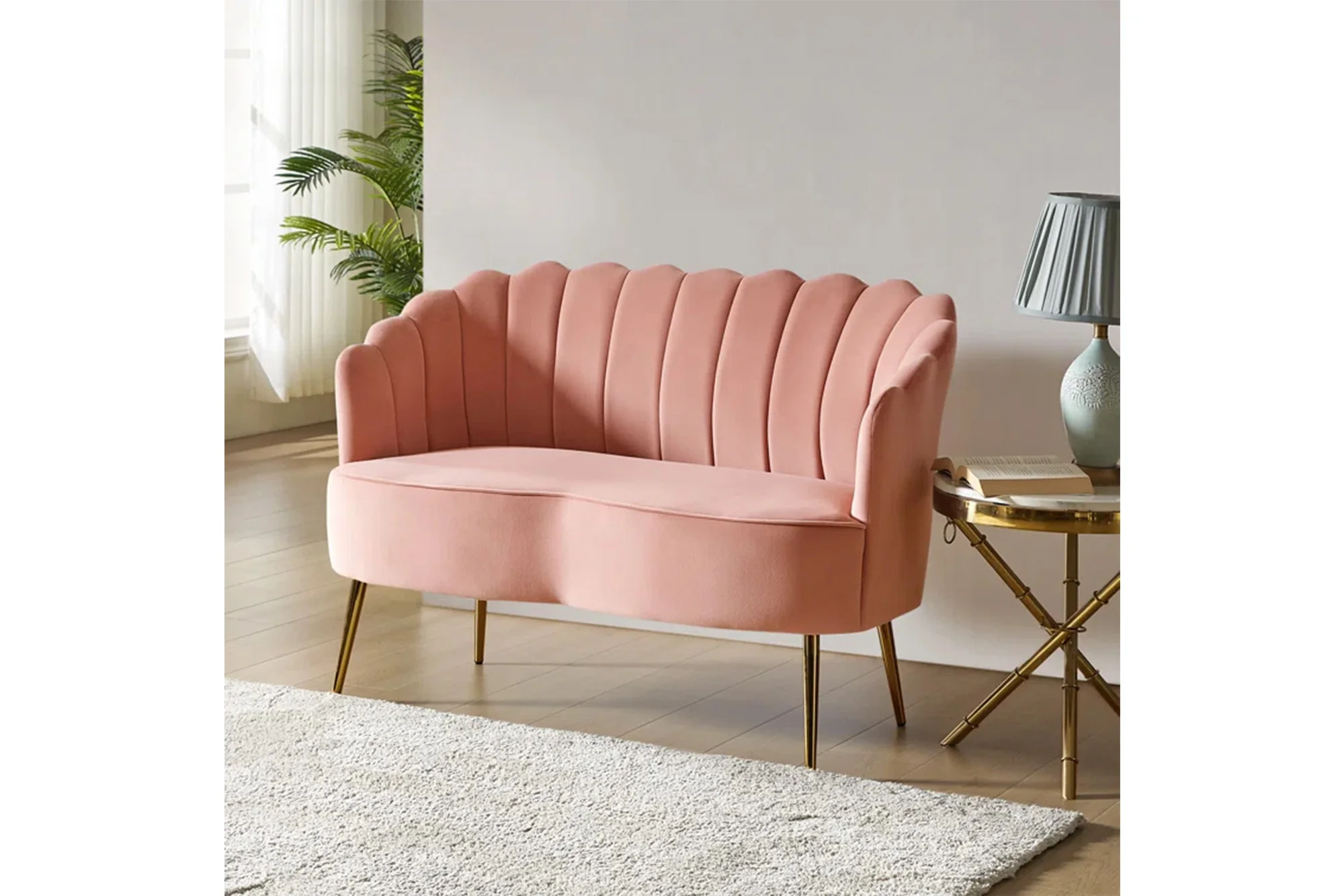 A pink loveseat