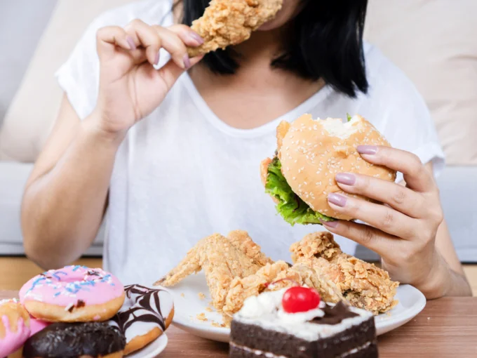eating junk food burger chicken eating junk food burger chicken