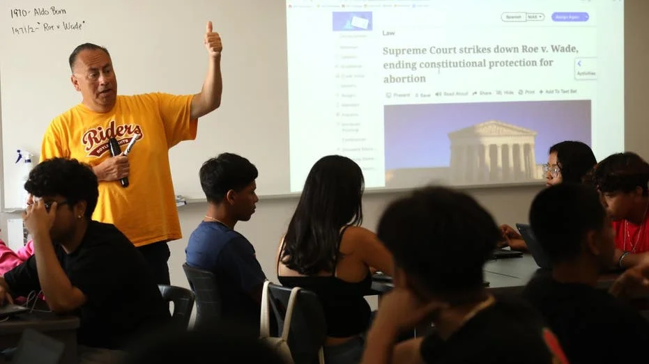 Teacher and students in classroom