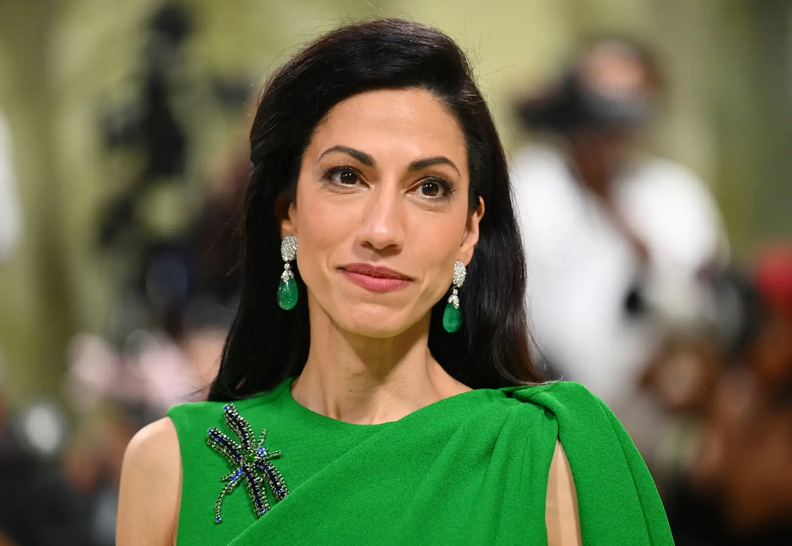 Image may contain Huma Abedin Head Person Face Black Hair Hair Adult Happy Smile Child Dimples and Photography