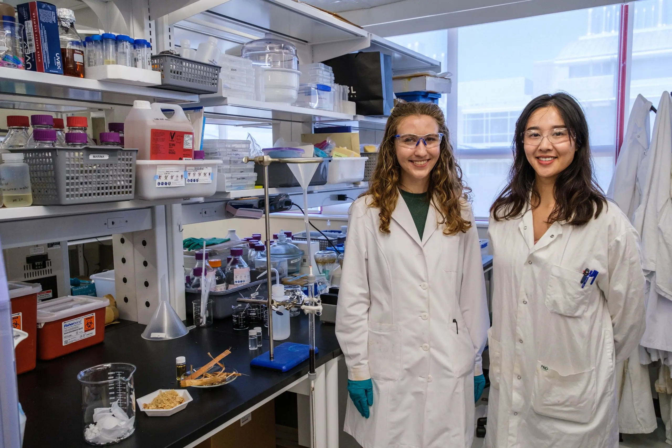 University of British Colombia researchers Tianyu Guo and Marina Mehling next to the ingredients of the bioCap filter. 