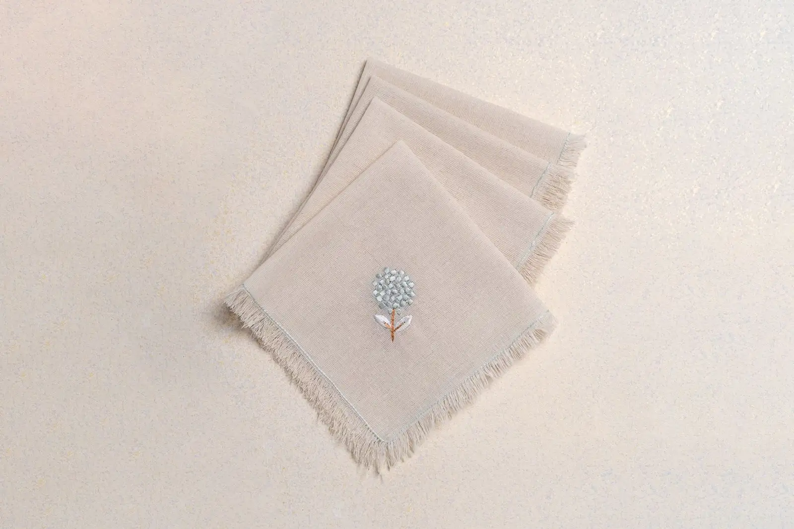 Image may contain Home Decor Linen and Napkin