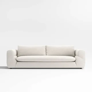 white boucle sofa with single cushion