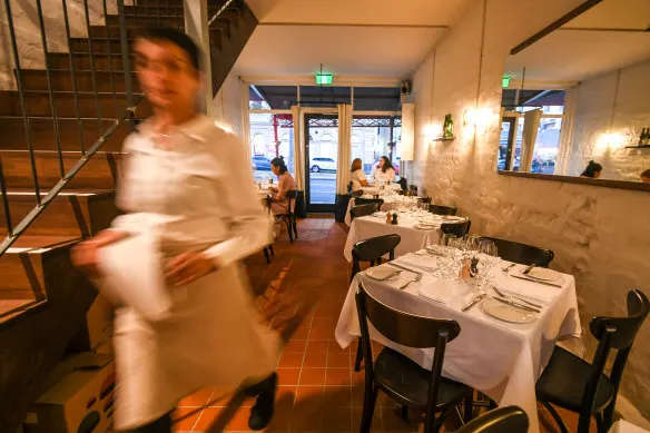 Peek inside Bistra to find white-clothed tables and whitewashed walls.