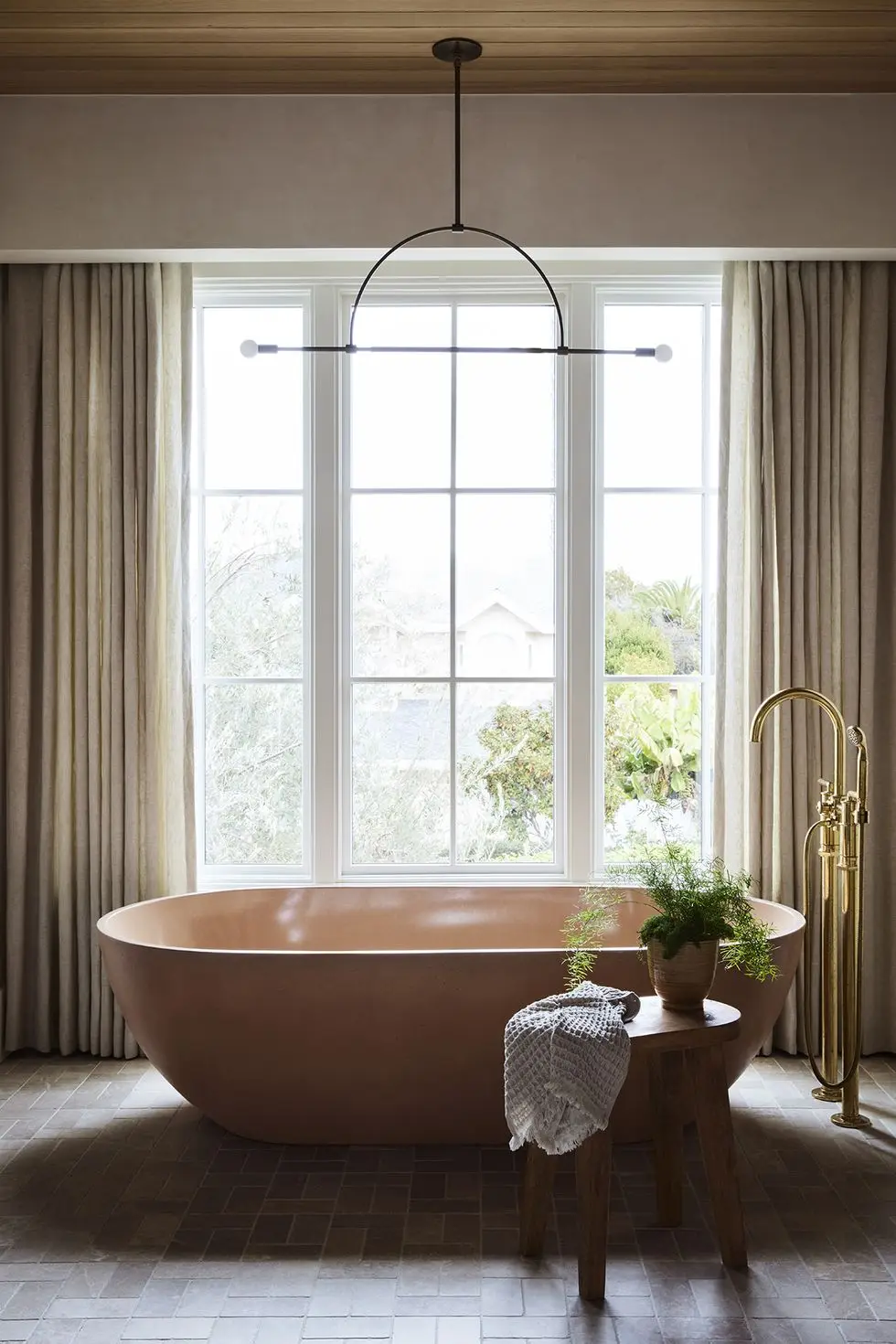 a large bathtub in a bathroom a large bathtub in a bathroom