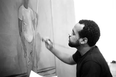 Noah Davis at work, Los Angeles (2009). Photo: Patrick O'Brien-Smith.