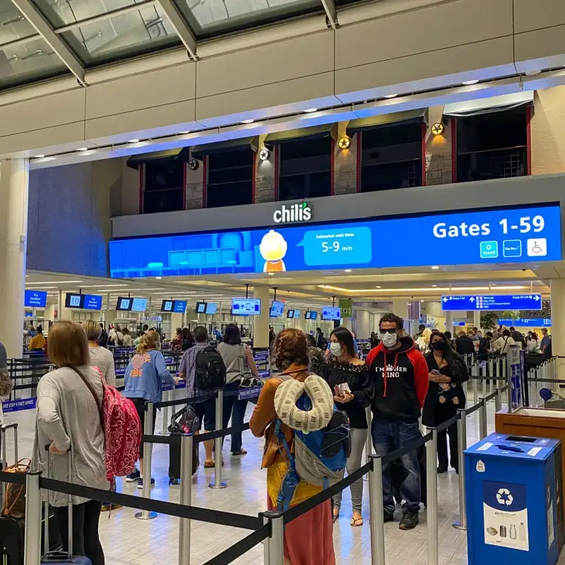 Travelers in line at TSA checkpoint