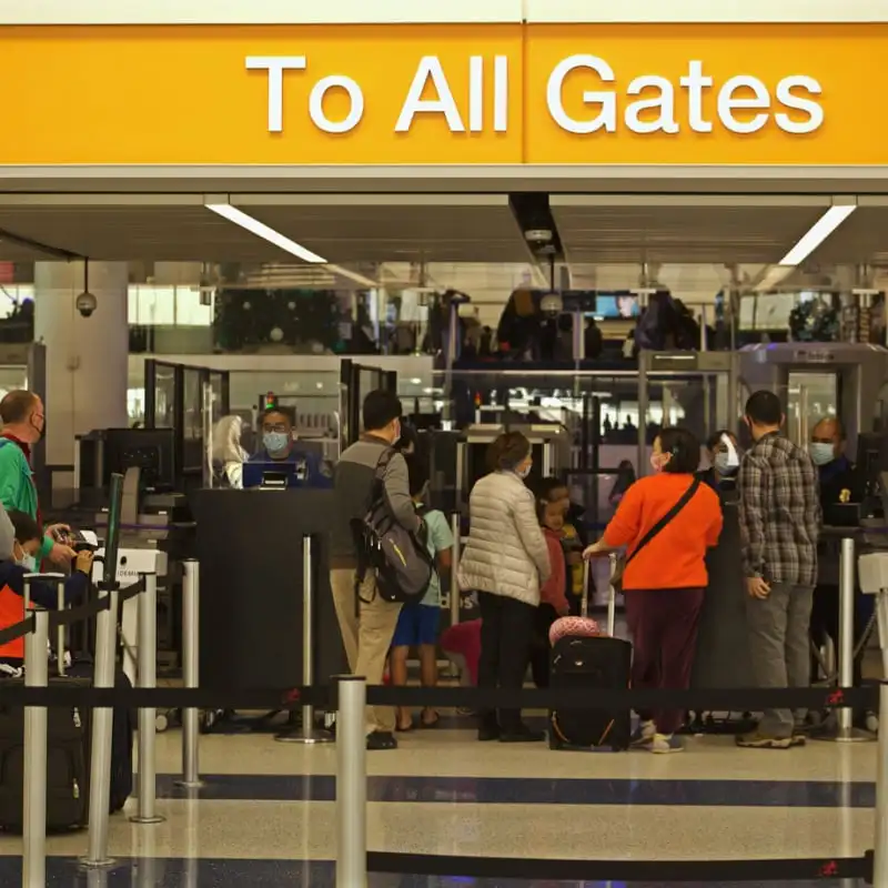 Travelers entering TSA checkpoint