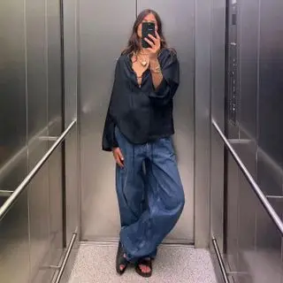 @majawyh outfit selfie in loose clothes and puffy heart necklace