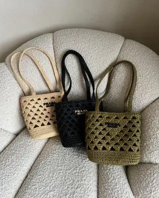 @threadsstyling Prada raffia totes.