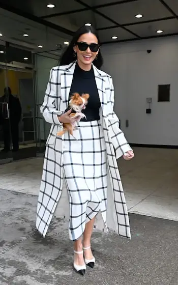 Few looks are complete for Moore without her favourite accessory – her chihuahua, Pilaf