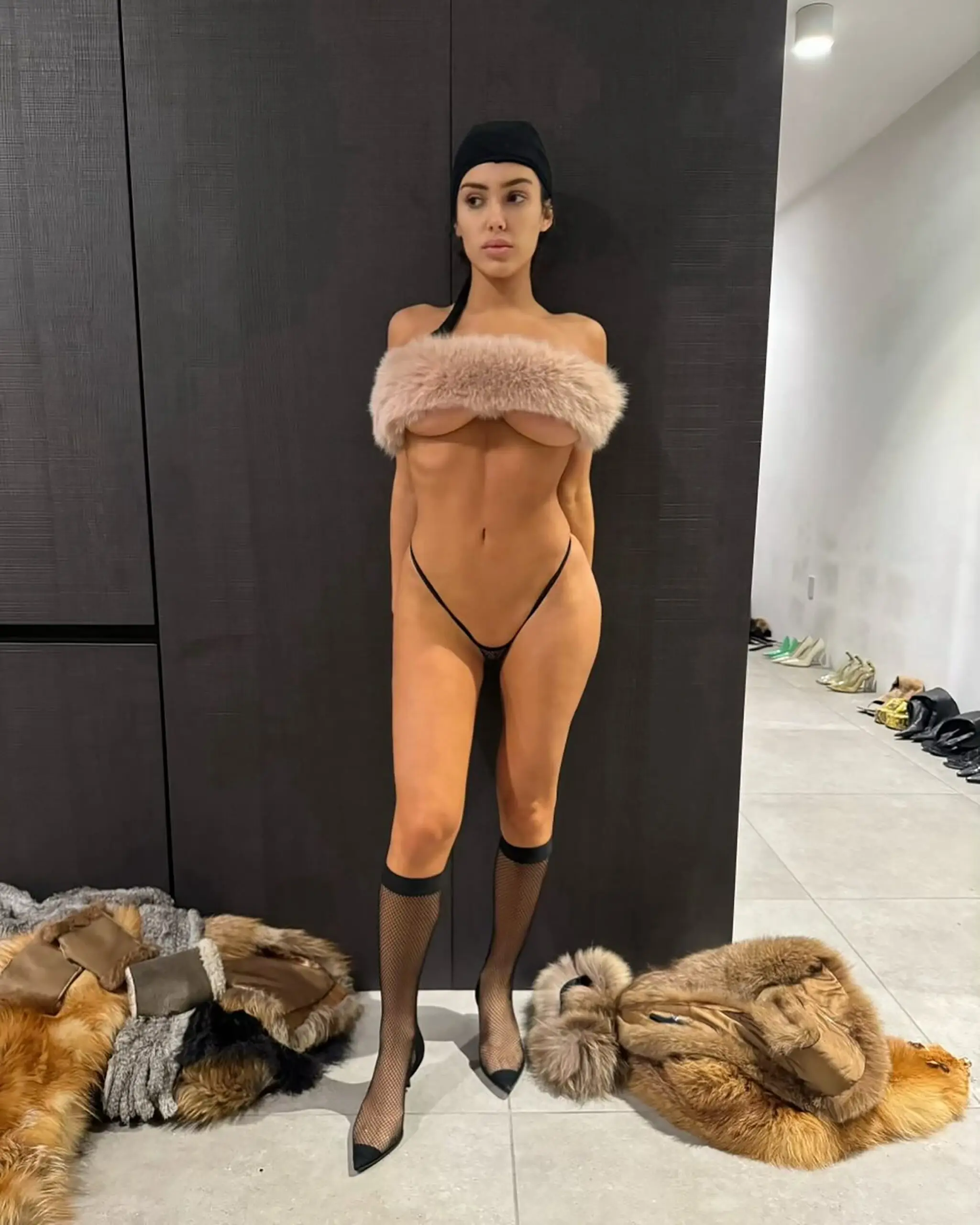 Kanye West has been accused by fans of 'forcing' his wife to wear skin-baring outfits