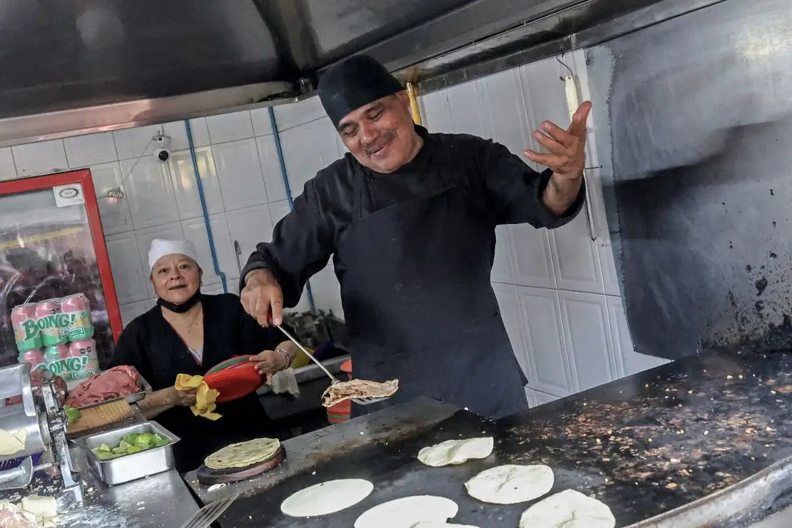 Chef Arturo Rivera Martinez prepares tacos at Taquería El Califa de León restaurant in Mexico City on May 15.