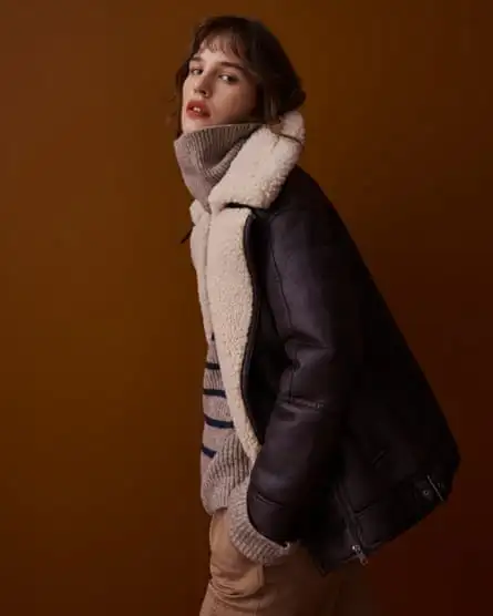 Model wearing clothes from the M&S Collection range: sheepskin lined leather flying jacket, striped jumper, trousers.